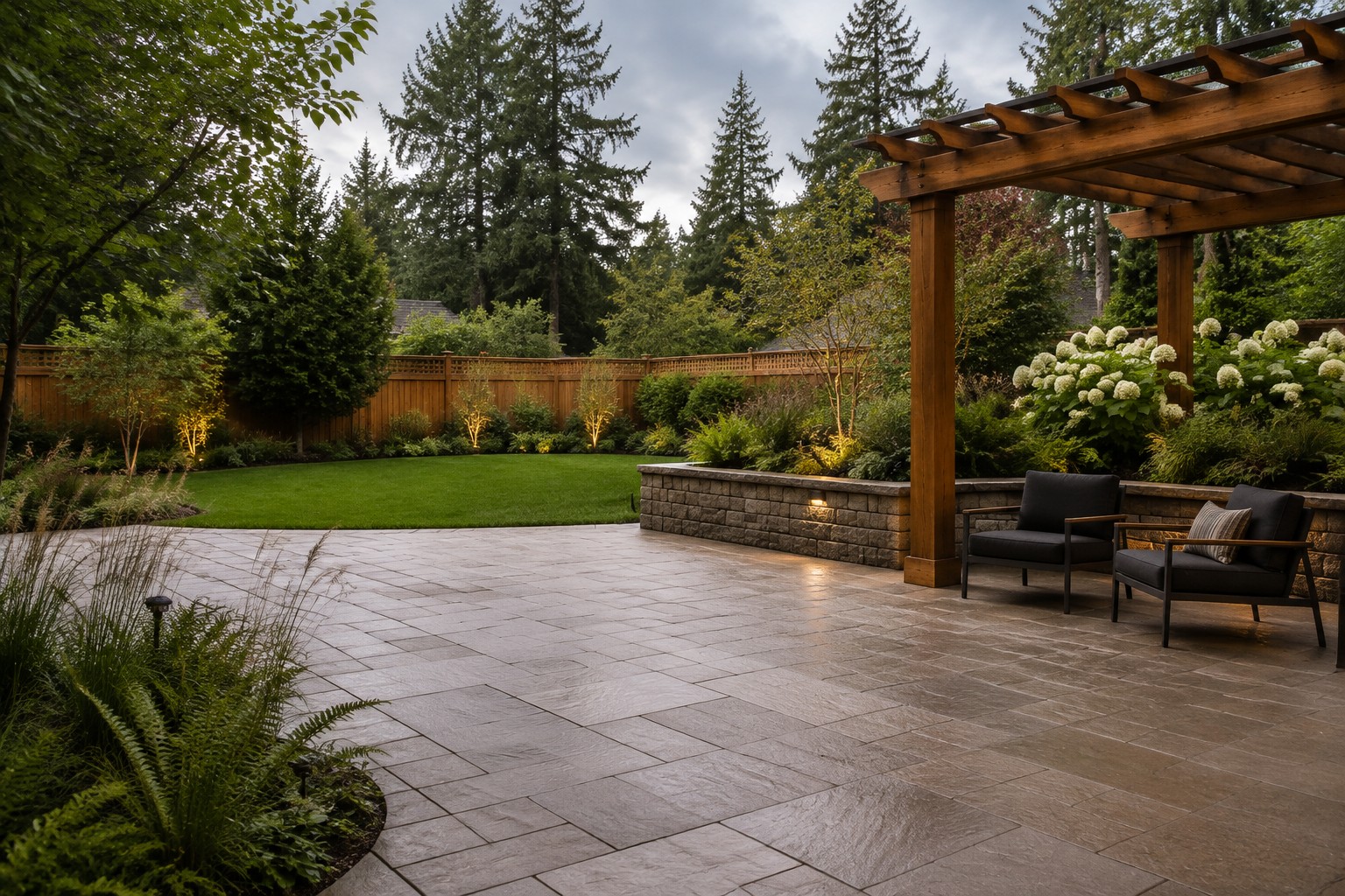A designed backyard with cedar pergola and stone patio